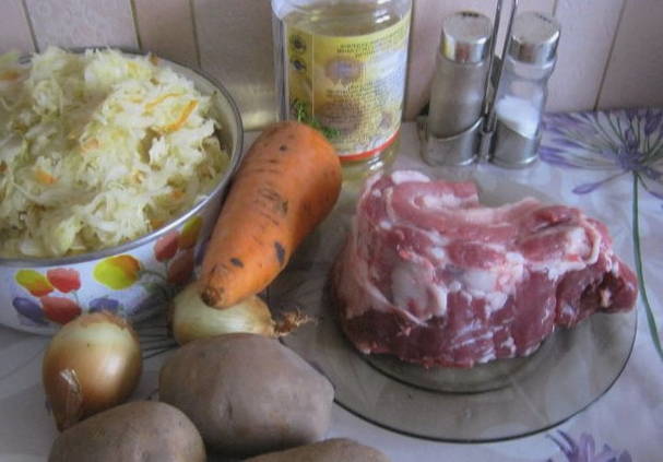 Тушеная капуста с картошкой и мясом в казане