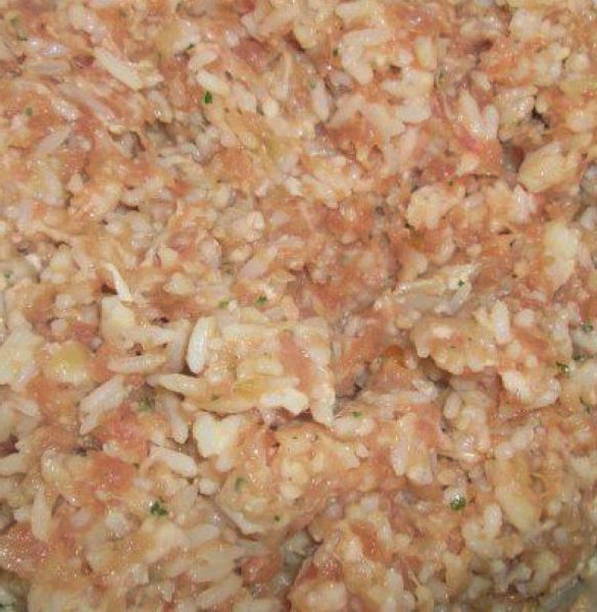Ежики из фарша с рисом в томатном соусе в духовке