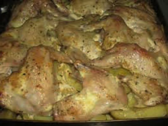 Куриные крылышки с овощами, запеченные в духовке