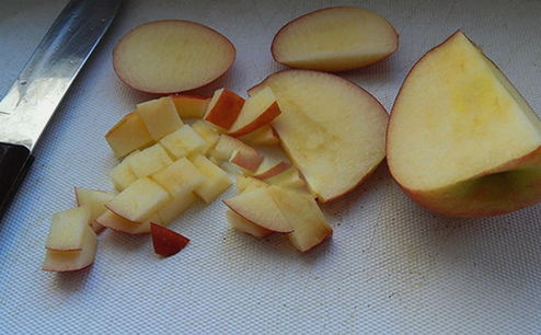 Тыква кусочками с медом и яблоками в духовке