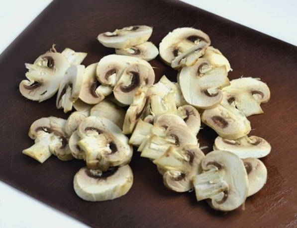 Свинина кусочками с грибами в духовке