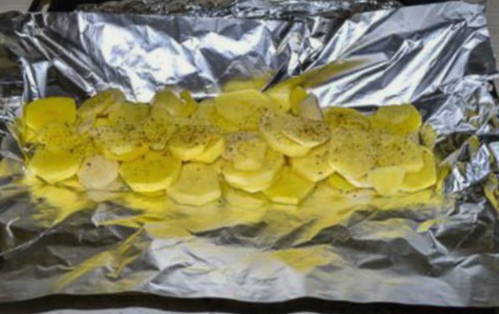 Судак, запеченный с картошкой в фольге в духовке