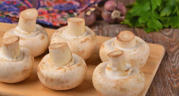 Шампиньоны с фаршем в духовке