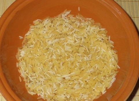 Рис с тушенкой в мультиварке