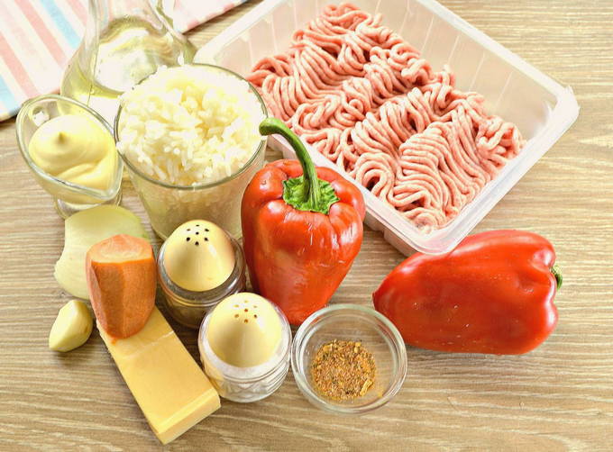 Фаршированный перец половинками под сыром в духовке