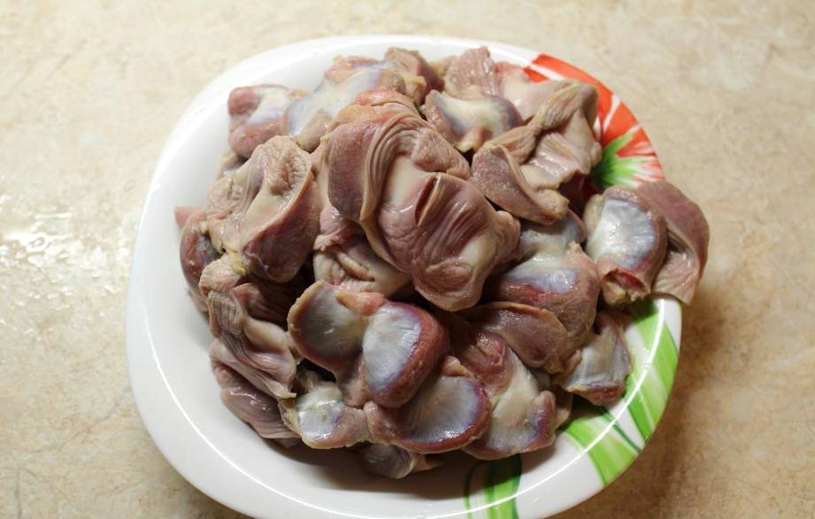 Куриные желудки в сметане в мультиварке