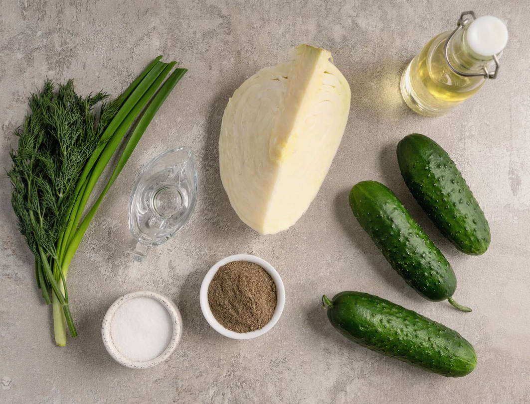 Салат из свежей капусты с огурцом и уксусом Салат из свежей капусты с огурцом и уксусом