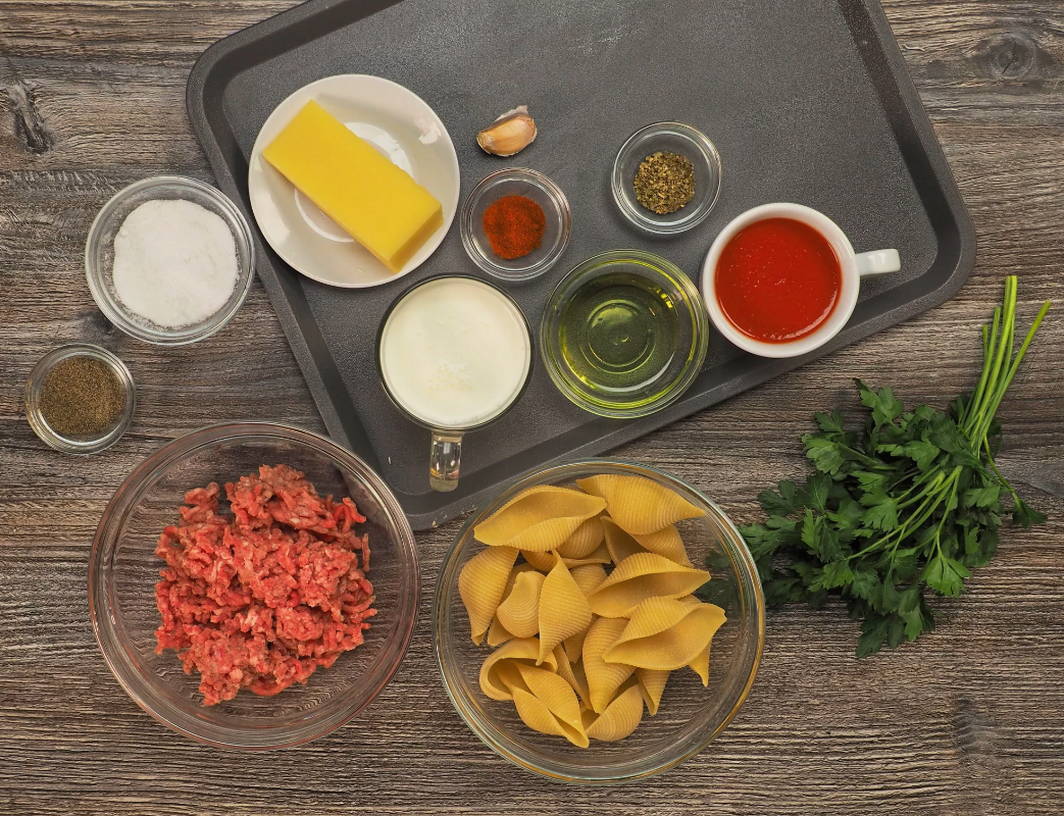 Макароны ракушки с фаршем под сыром со сливками в духовке