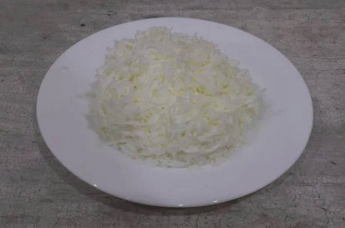Салат «Нежность» с крабовыми палочками и сыром